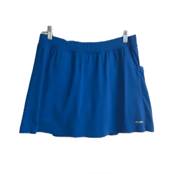 🔴 4/$15 REEBOK cobalt blue perforated mini athletic skirt skort size M in EUC - Picture 1 of 12